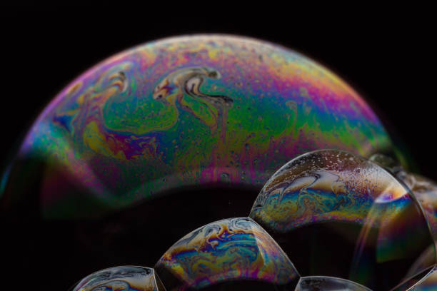 istock A bubble in rainbow colors on a black background. 1134188195
