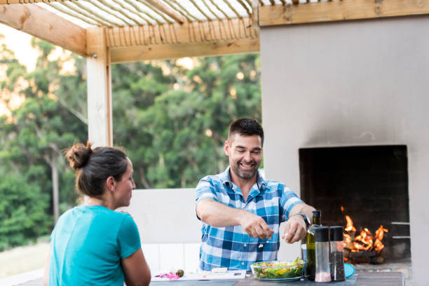 istock Smiling husband and wife having lunch together 1134188553