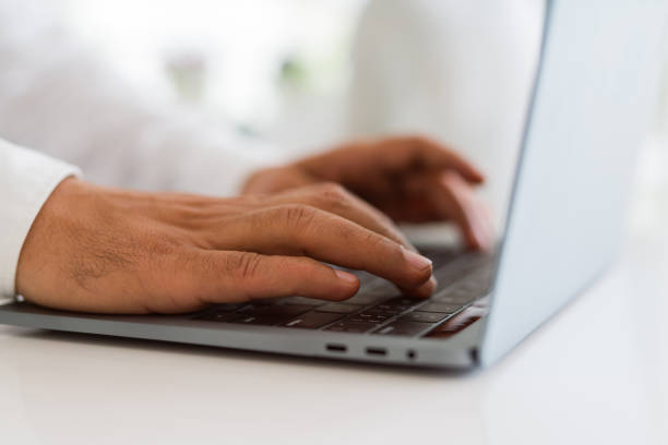 istock Close up of business man working using computer laptop 1134188582