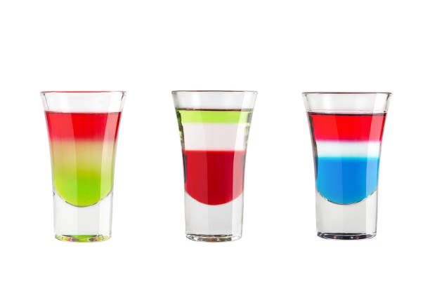 istock Alcohol shots on a white background. Three shots with bright colors. 1134191006