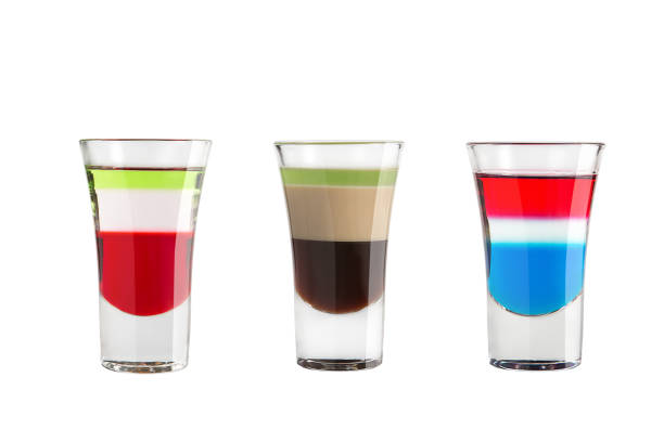 istock Alcohol shots on a white background. Three colorful shots. 1134191189