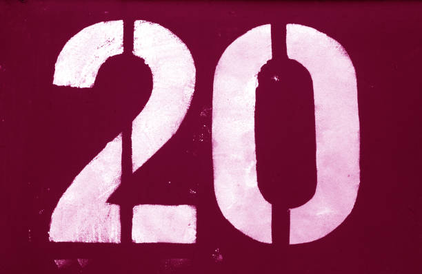 istock Number 20 in stencil on metal wall in pink tone. 1134192352