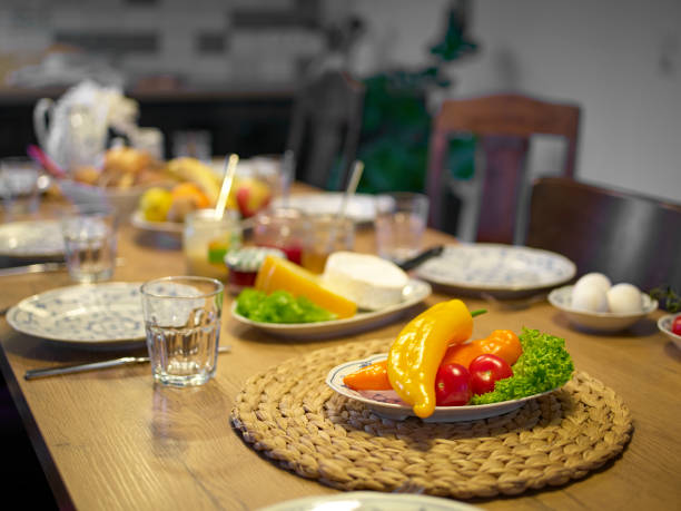 istock wooden table set for breakfast focused on bell peppers 1134197109