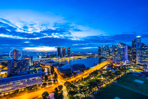 istock High Angle View Of Illuminated Buildings Against Blue Sky 1134202921