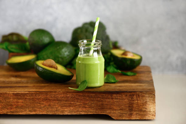 istock Smoothies in a small glass bottle, front view 1134209691