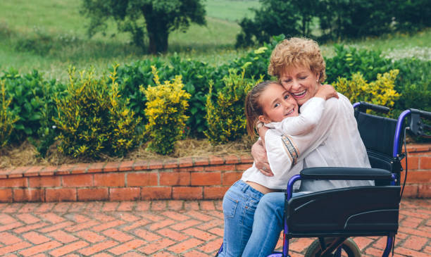 istock Granddaughter hugging her grandmother 1134209748