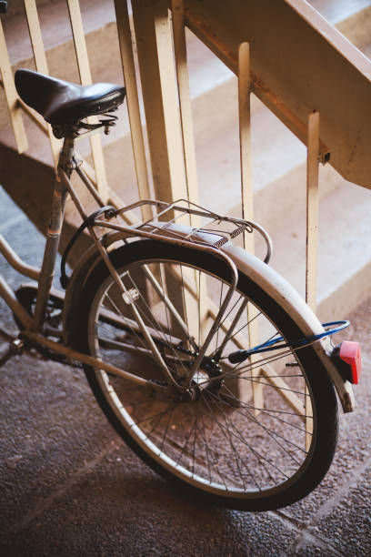 istock Old Bike Locked to Fence 1134209935