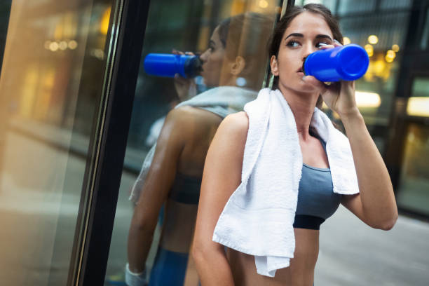 istock Young sporty girl making a break from exercising 1134215747