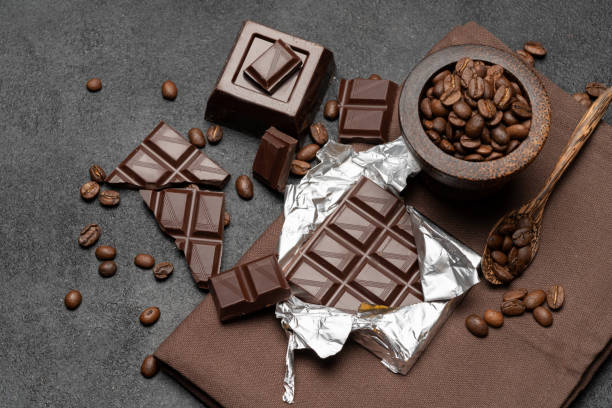 istock dark organic chocolate and coffee beans on concrete background 1134220195