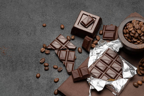 istock dark organic chocolate and coffee beans on concrete background 1134220202