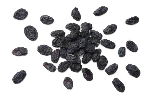 istock black raisins isolated on white background. top view 1134221719