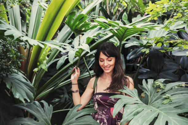 istock Woman in botanical garde 1134232551