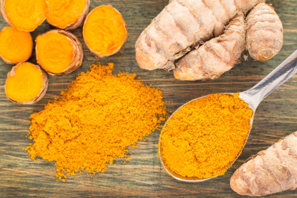 istock Turmeric powder and fresh turmeric. Curcuma longa 1134234054