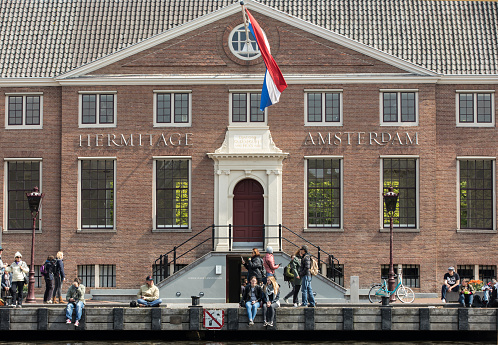 Amsterdam, Netherlands - April 20, 2017: Tourists outside the Hermitage Amsterdam, the Netherlands