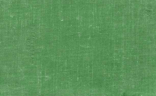 istock Old grungy canvas pattern with dirty spot in green color. 1134236967