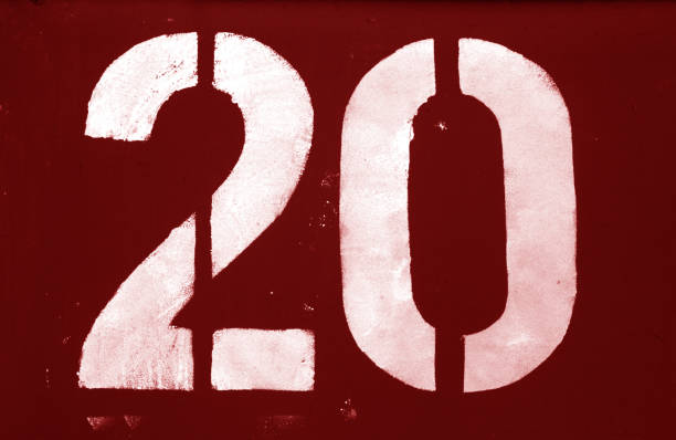 istock Number 20 in stencil on metal wall in red tone. 1134237816