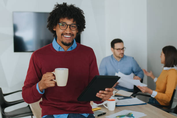 istock African American businessman using digital tablet during coffee break 1134238038