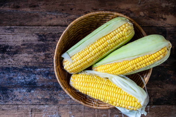 istock Fresh corn in basket on  on wooden table 1134241054