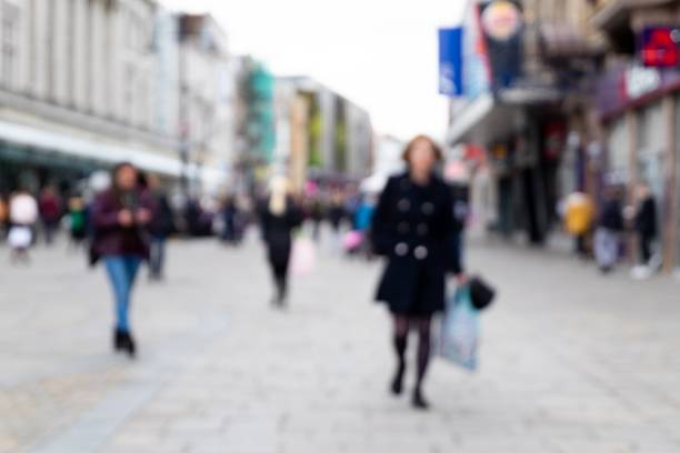 istock Defocused Image of People Walking the Streets 1134242302