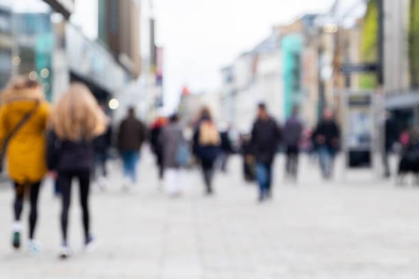 istock Defocused Image of People Walking the Streets 1134242374