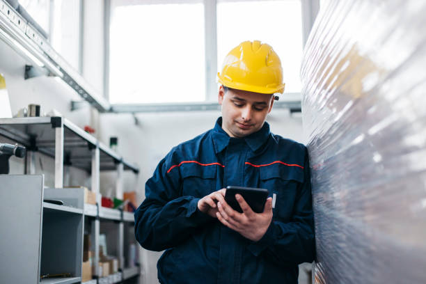 istock Steel factory supervisor with control tablet -blue collar workers 1134244214