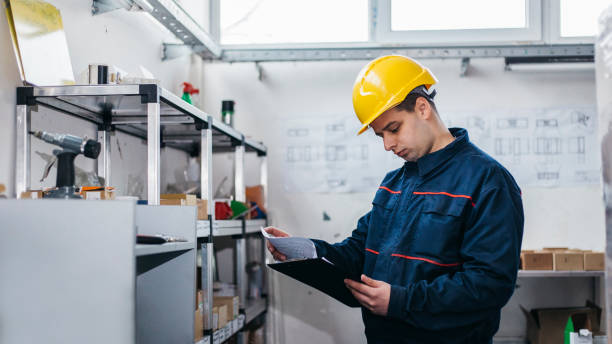 istock Steel factory supervisor with clipboard 1134244217