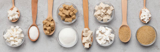 istock Collection of different kinds of sugar on gray background 1134244372