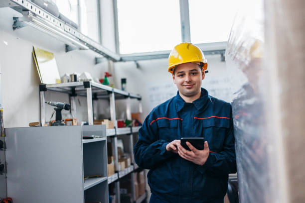 istock Steel factory supervisor with control tablet -blue collar workers 1134244400