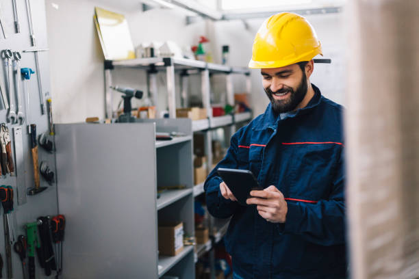 istock Steel factory supervisor with control tablet -blue collar workers 1134244484
