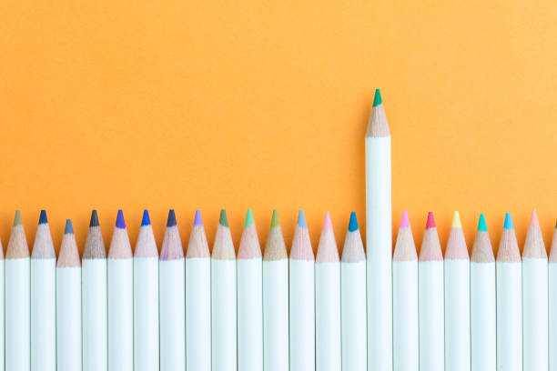 istock Color pencil in row with stand out green one using as unique, individual creativity, leadership idea 1134245834