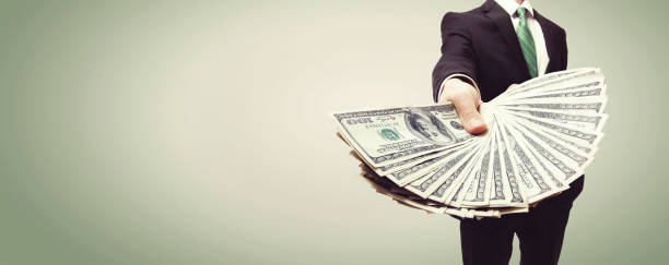 istock Business man with cash 1134247905