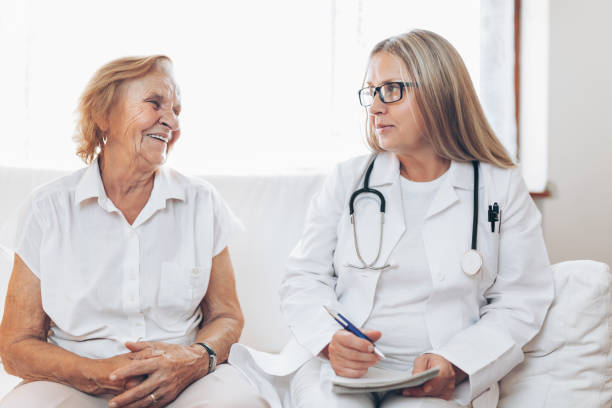 istock Senior woman during a medical exam with practitioner 1134248105