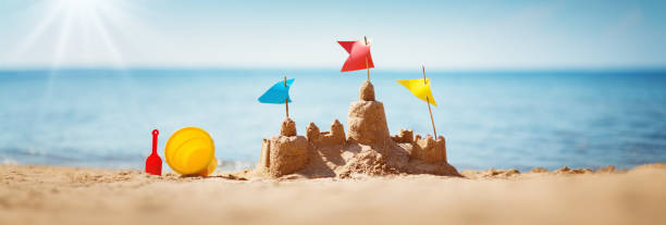 istock Sandcastle on the sea in summertime 1134248417