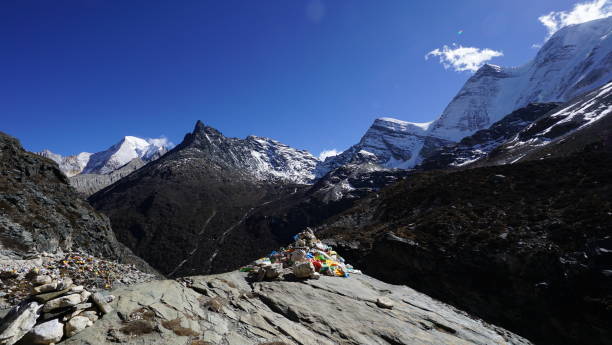 istock prayer flags,snow mountain,pure,sky 1134249739