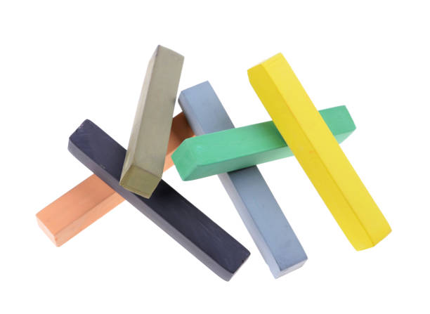 istock Colorful chalk pastels arranged on a isolated white background  - education, arts,creative 1134249938