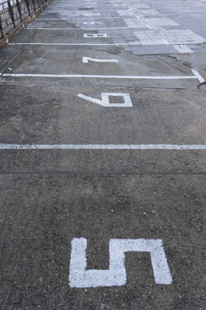 istock Car parking lot with white lines mark 1134250843