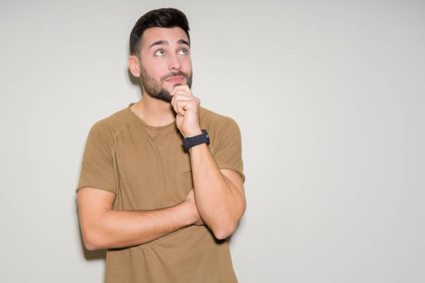 istock Young handsome man over isolated background serious face thinking about question, very confused idea 1134253203