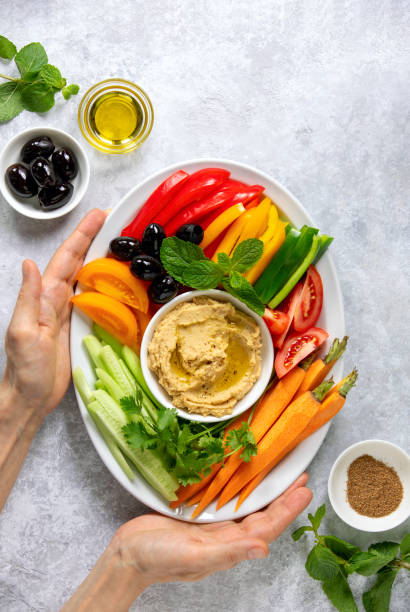 istock Homemade hummus with fresh vegetables 1134253631