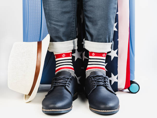 istock Men's legs, US Flag and bright socks 1134253737