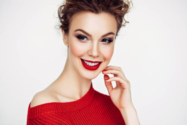istock Beautiful woman. Red sweater and red lipstick. 1134256564