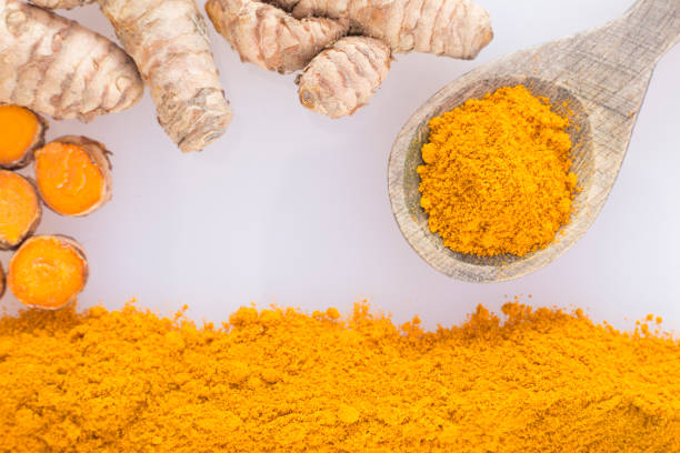 istock Turmeric powder and fresh turmeric. Curcuma longa 1134258313
