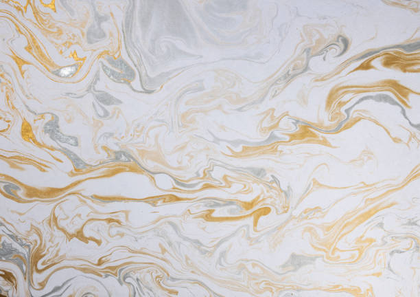 istock marble ink paper texture white silver gold 1134258950