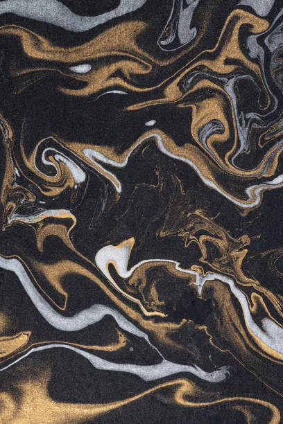 istock marble ink paper texture black silver gold 1134259647