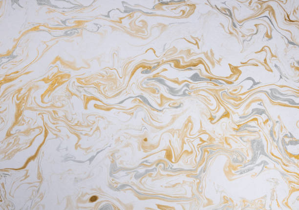 istock marble ink paper texture white silver gold 1134259651
