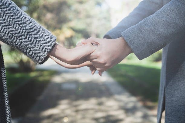 istock young couple hands love hold hands 1134260258