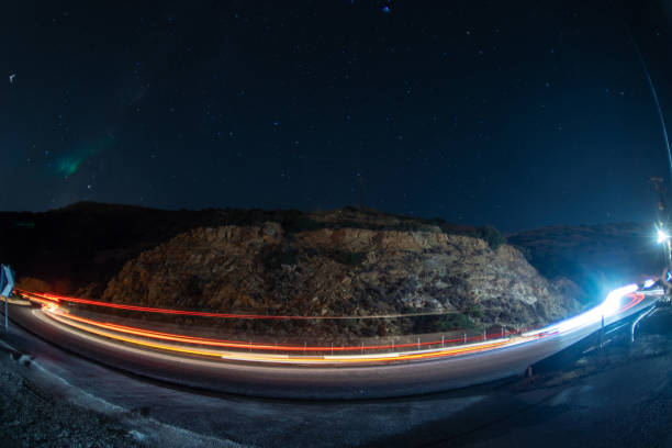 istock car light trails on serpentine road 1134261728