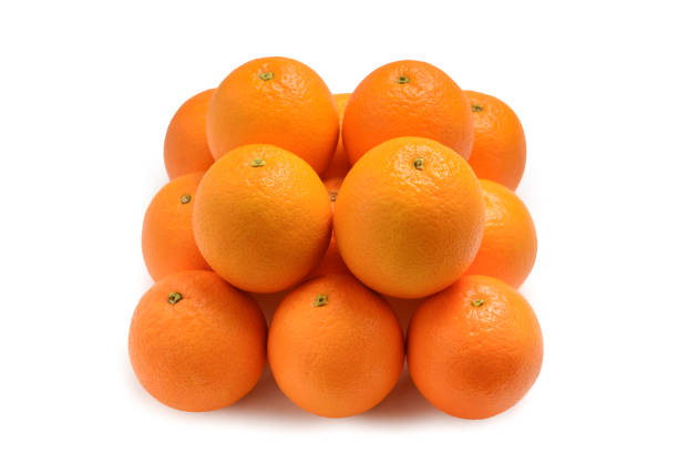 istock Pyramid of Oranges isolated on white background. 1134263507