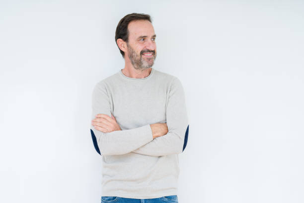 istock Elegant senior man over isolated background smiling looking side and staring away thinking. 1134264327