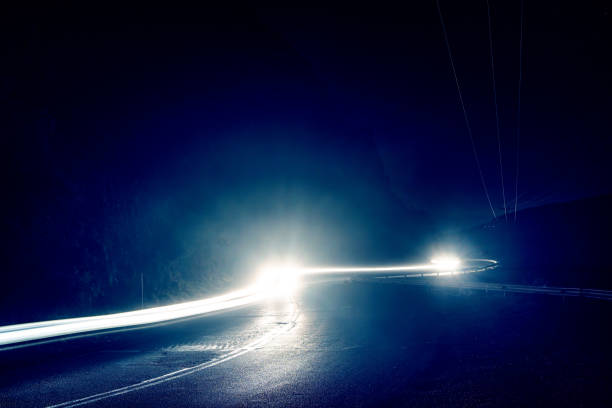 istock car light trails on serpentine road 1134268251