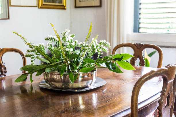 istock centerpiece with flowers and leaves 1134268342